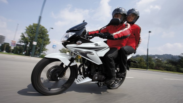 HSM Two people on a motorcycle