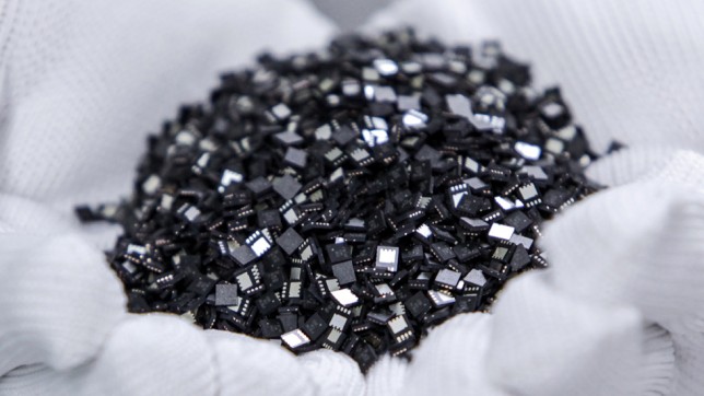 Micro chip  Collection of micro chips in the palm of a hand